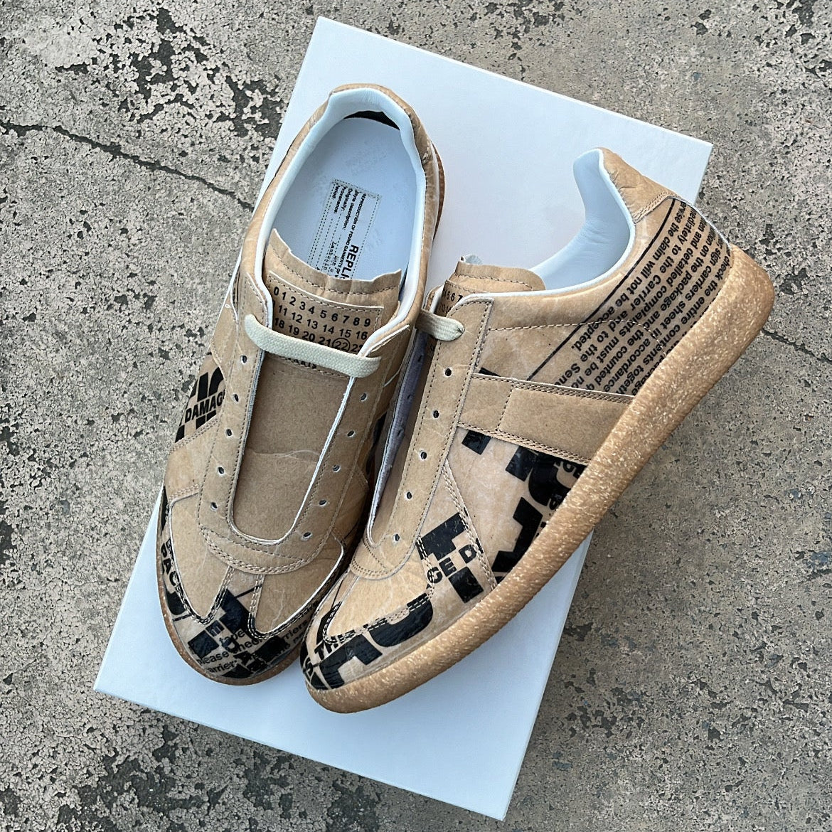 Maison Margiela GAT Newspaper Taped - EU40 / US7 / UK6 – Likma.Store
