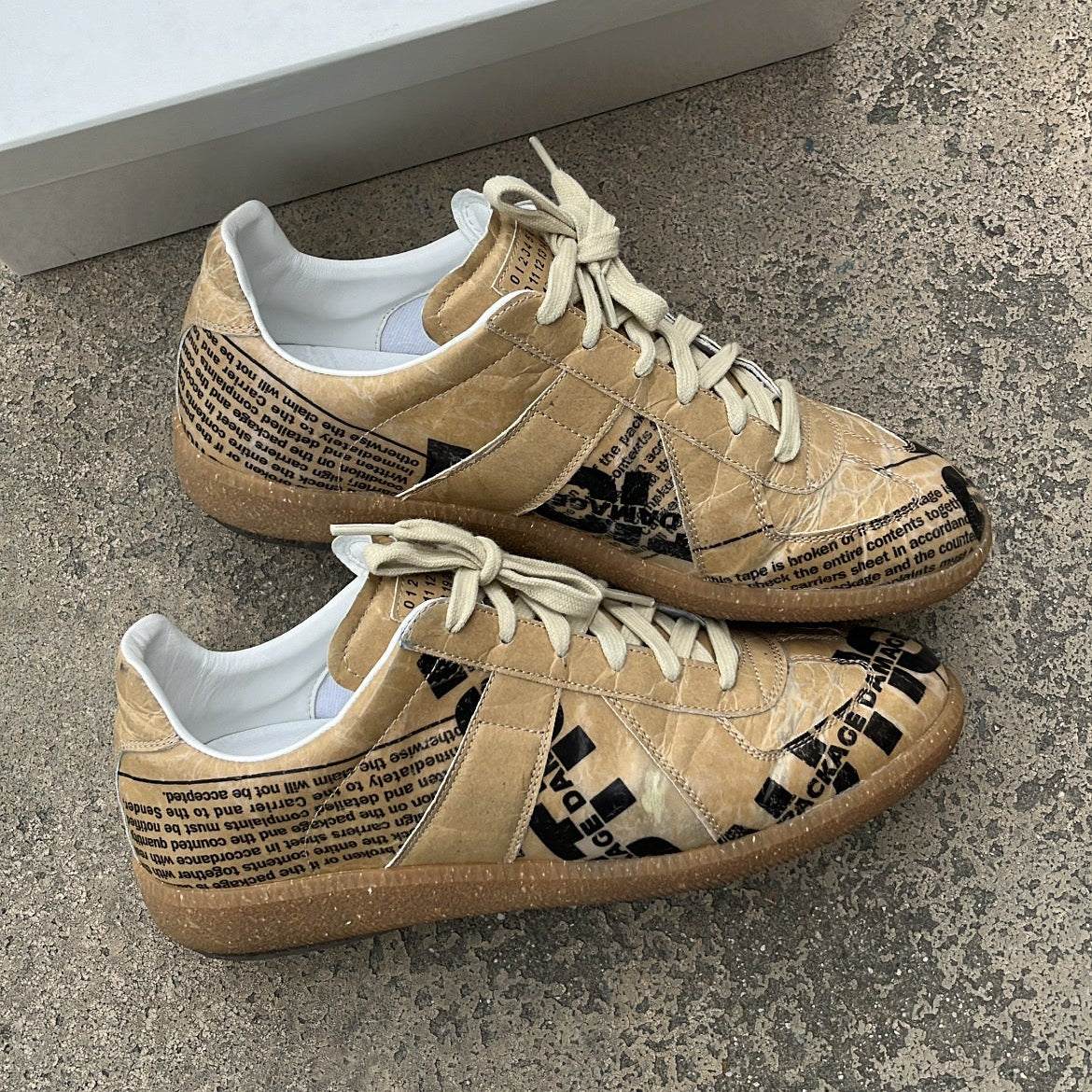 Maison Margiela GAT Newspaper Taped - EU43 / US9.5 / UK8.5