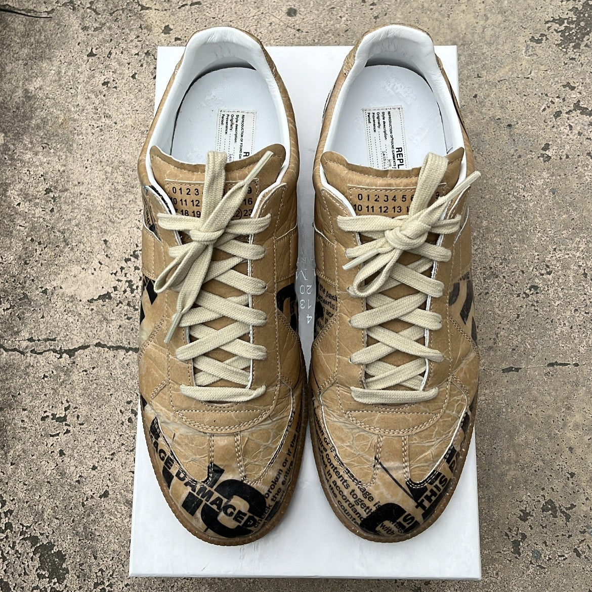 Maison Margiela GAT Newspaper Taped - EU43 / US9.5 / UK8.5