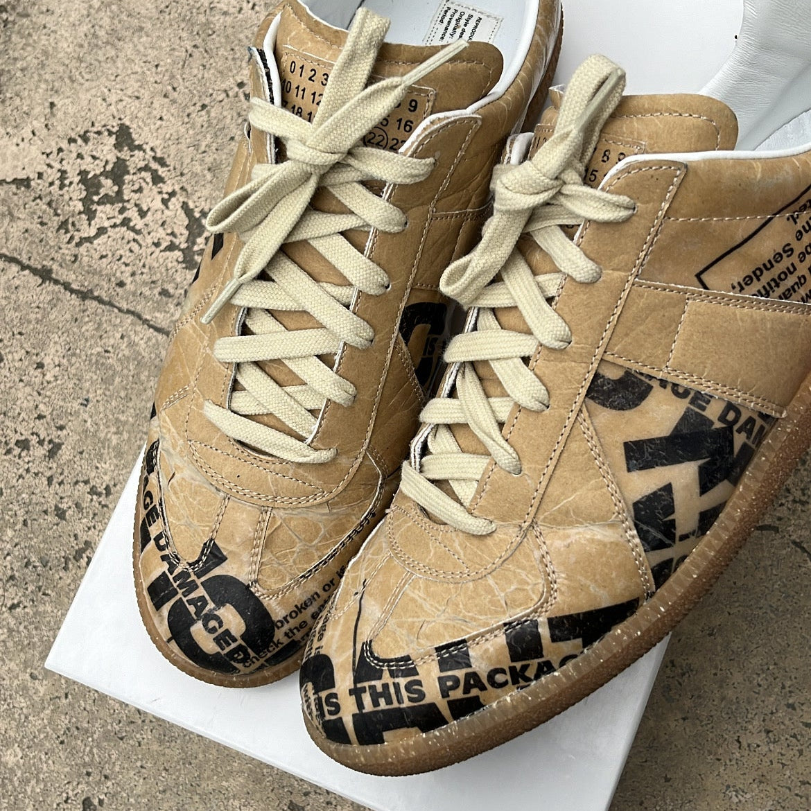 Maison Margiela GAT Newspaper Taped - EU43 / US9.5 / UK8.5